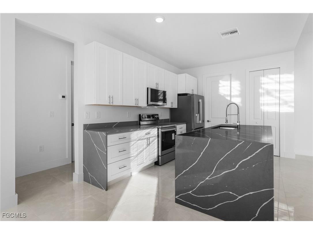 1026 Nelson Road N Cape Coral FL 33993 2025005728 image12