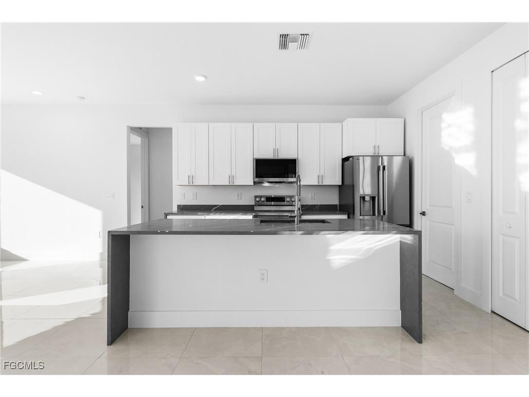 1026 Nelson Road N Cape Coral FL 33993 2025005728 image13