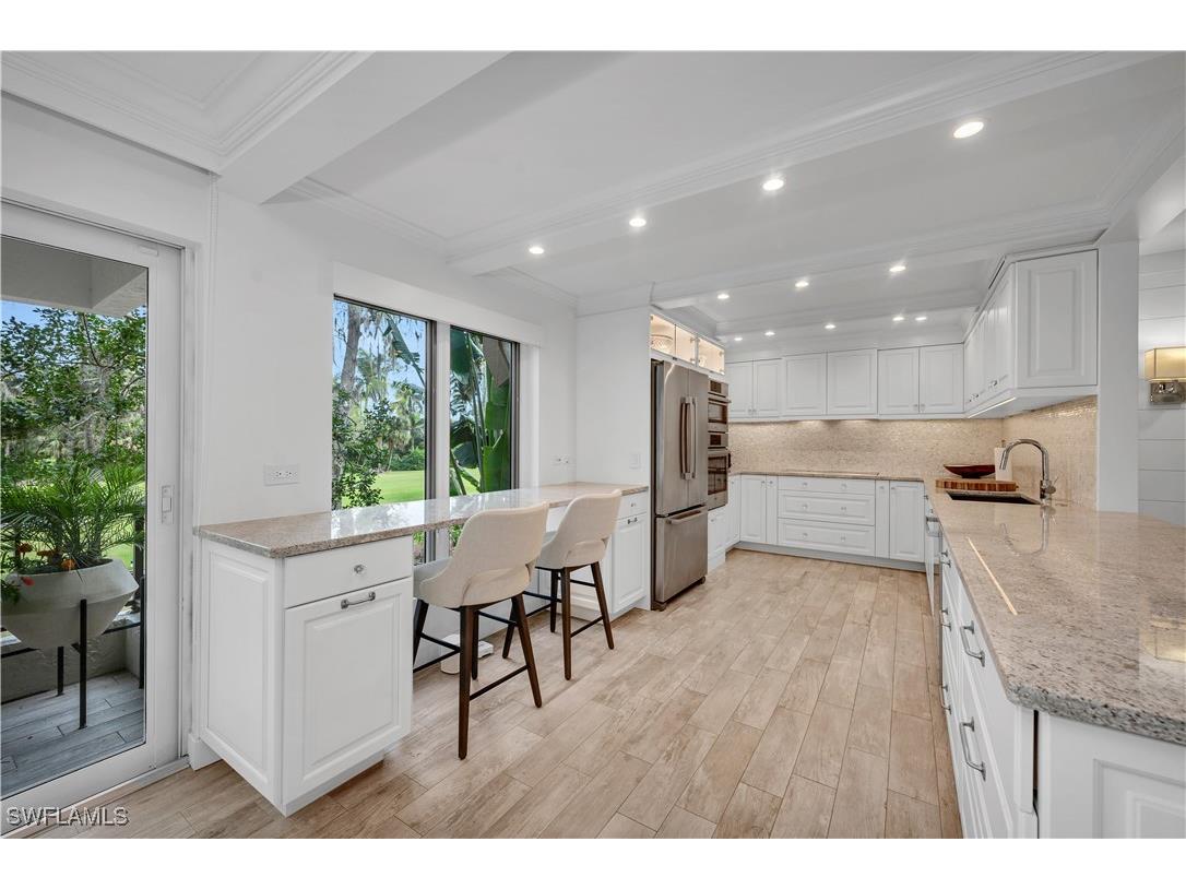 103 Wilderness Drive #201 Naples FL 34105 225029315 image1