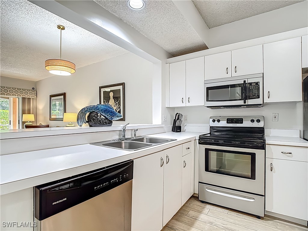 1044 Woodshire Lane #B102 Naples FL 34105 225054404 image1