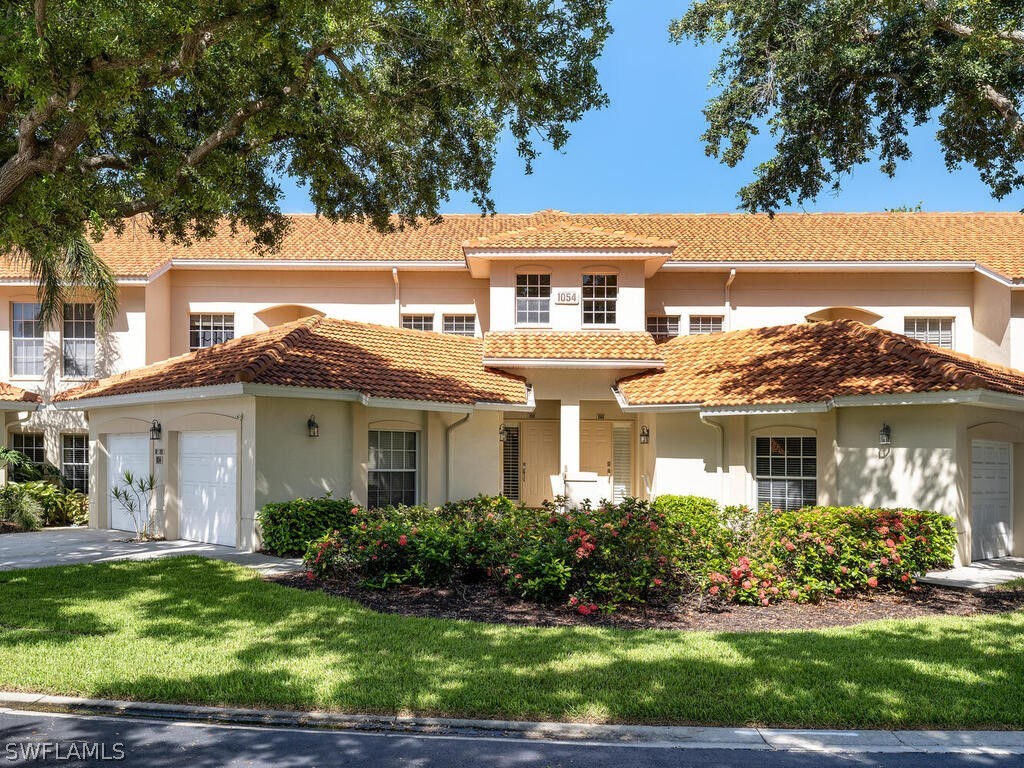 1054 Egrets Walk Circle #202 Naples FL 34108 224056199 image1