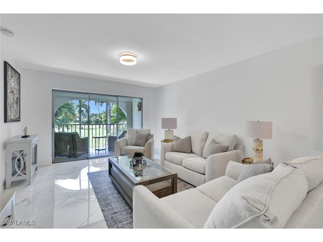 1055 Forest Lakes Drive #F203 Naples FL 34105 225070618 image1