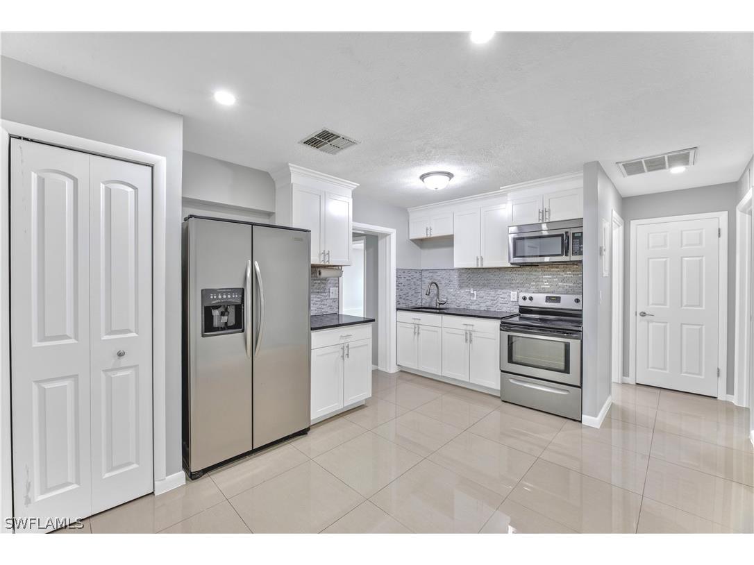 1122 Wesley Street W Lehigh Acres FL 33936 224037228 image1