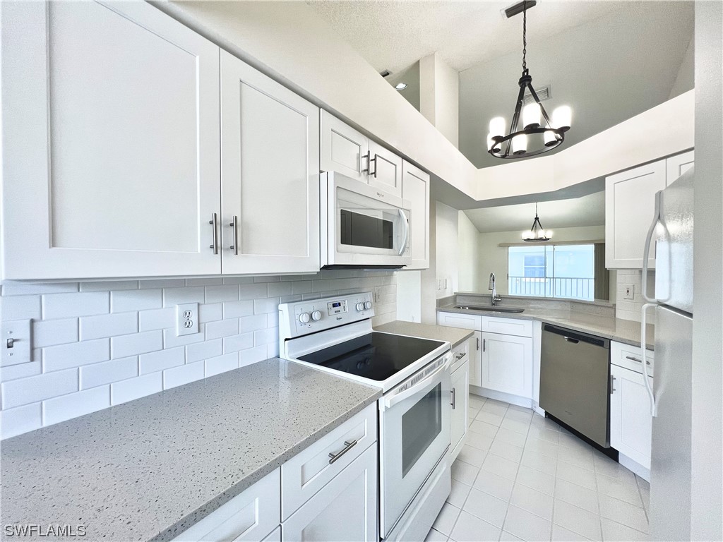 113 Wading Bird Circle #W-206 Naples FL 34110 223037900 image1