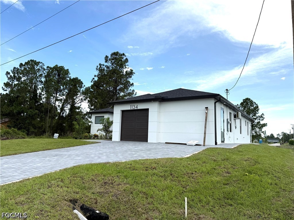 1134 Holmes Avenue S Lehigh Acres FL 33974 2026024099 image1