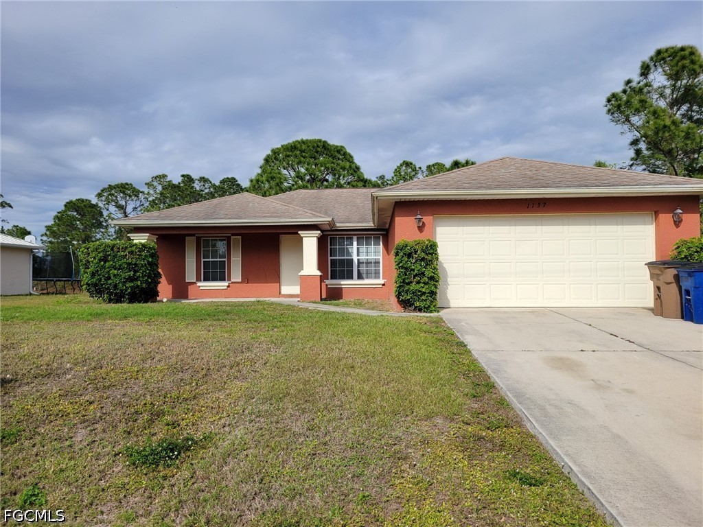 1137 Deauville Street E Lehigh Acres FL 33974 2026020039 image1