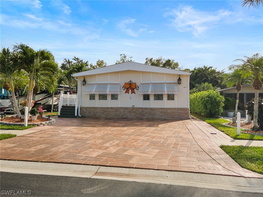 1203 Silver Lakes Boulevard Naples FL 34114 223091909 image1