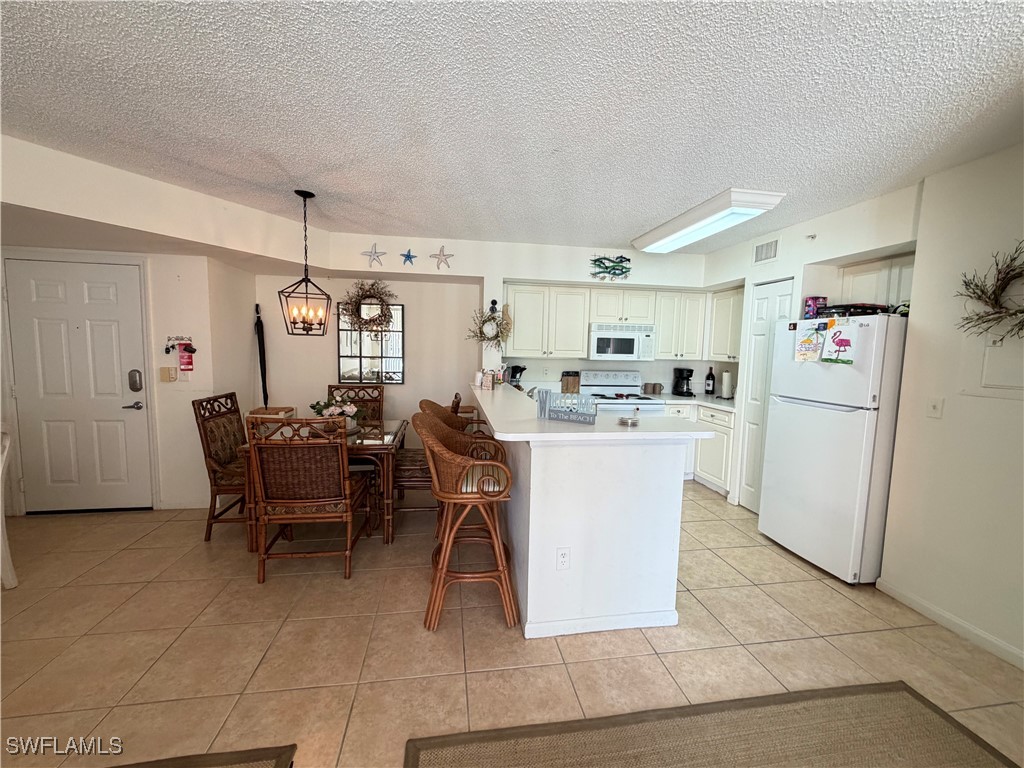 1220 Wildwood Lakes Boulevard #105 Naples FL 34104 225072954 image1