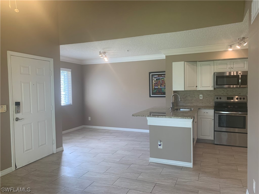 1240 Wildwood Lakes Boulevard #208 Naples FL 34104 223067390 image1