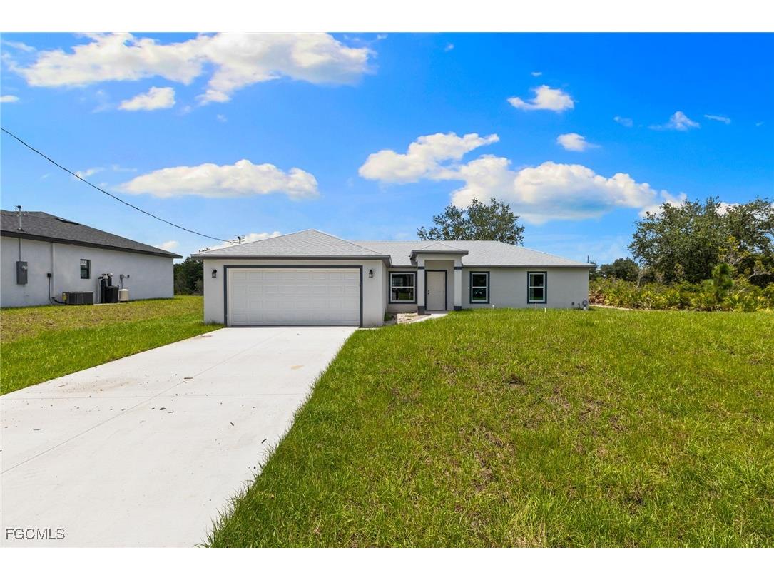 1246 Ecclesia Street E Lehigh Acres FL 33974 2025022312 image1