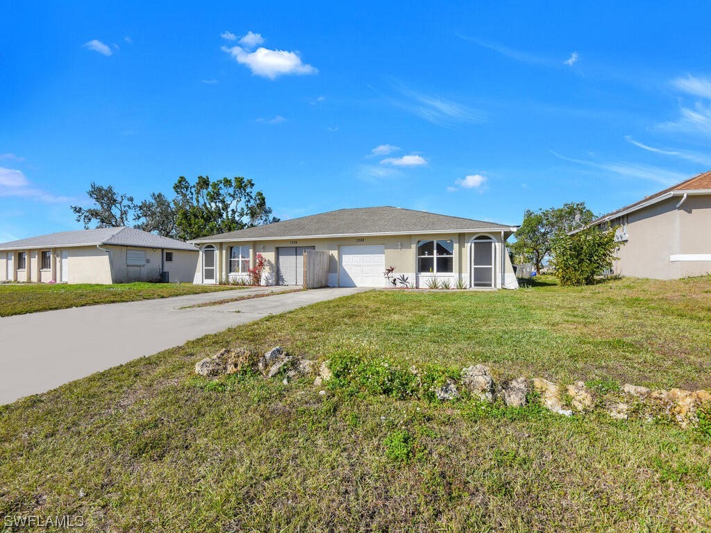 1306/1308 NE 8th Place Cape Coral FL 33909 223012534 image1