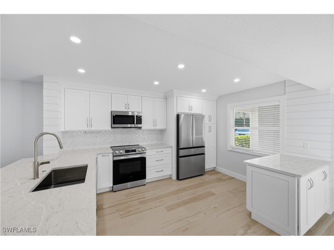 1330 Derbyshire Court #E101 Naples FL 34116 225081098 image1