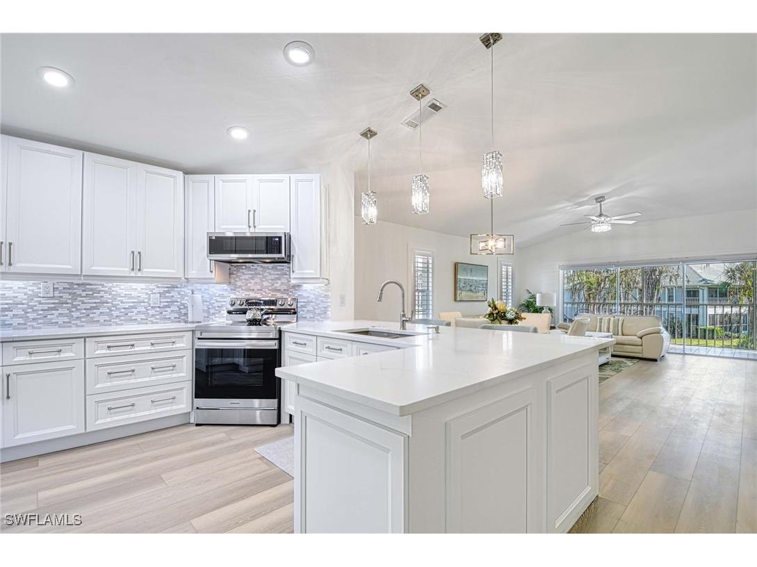 1350 Misty Pines Circle #E201 Naples FL 34105 225012758 image1