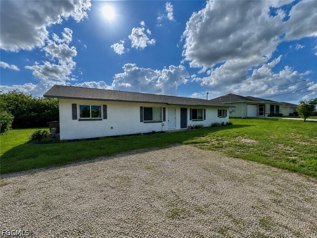 142 Harry Avenue S Lehigh Acres FL 33973 2026026399 image1