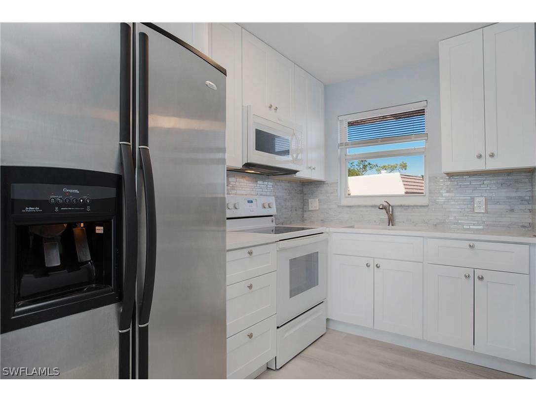 190 Turtle Lake Court #311 Naples FL 34105 223003832 image1