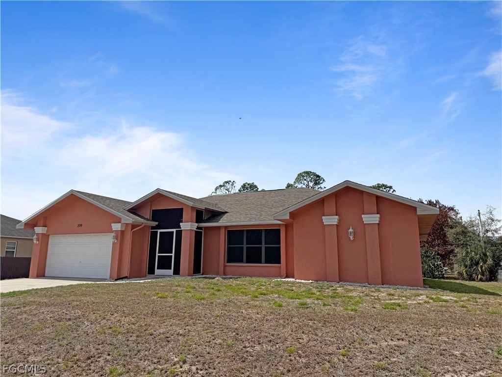 209 Mcarthur Avenue Lehigh Acres FL 33936 2026013771 image1