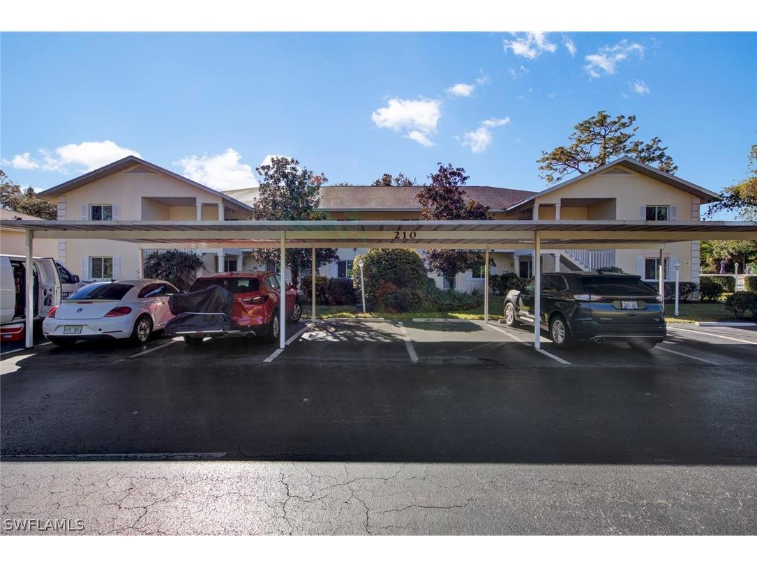 210 Timber Lake Circle #A102 Naples FL 34104 223002034 image1