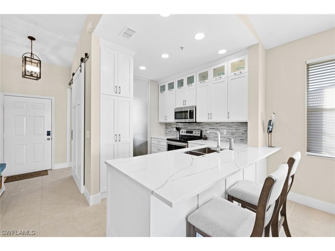 2315 Carrington Court #201 Naples FL 34109 224006575 image1