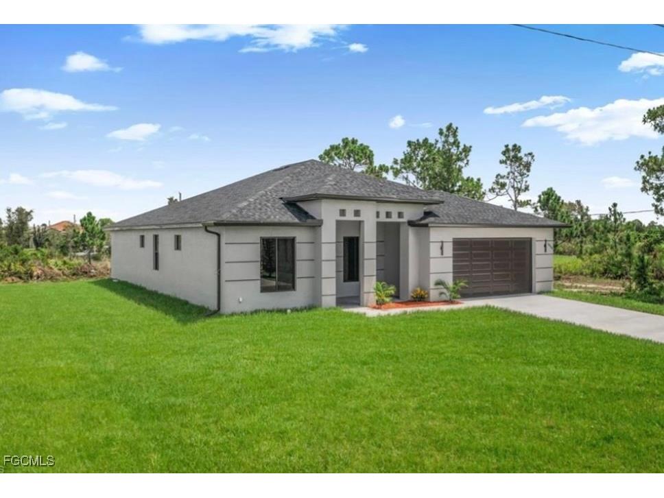238 Narcissus Avenue S Lehigh Acres FL 33974 2025017365 image1