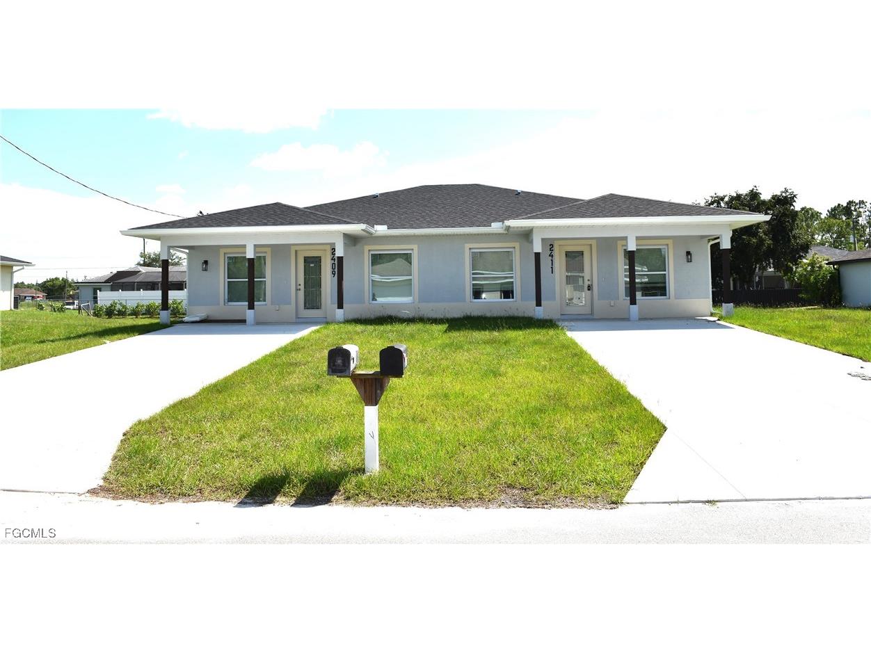 2409/2411 Churchill Avenue N Lehigh Acres FL 33971 2025003301 image1