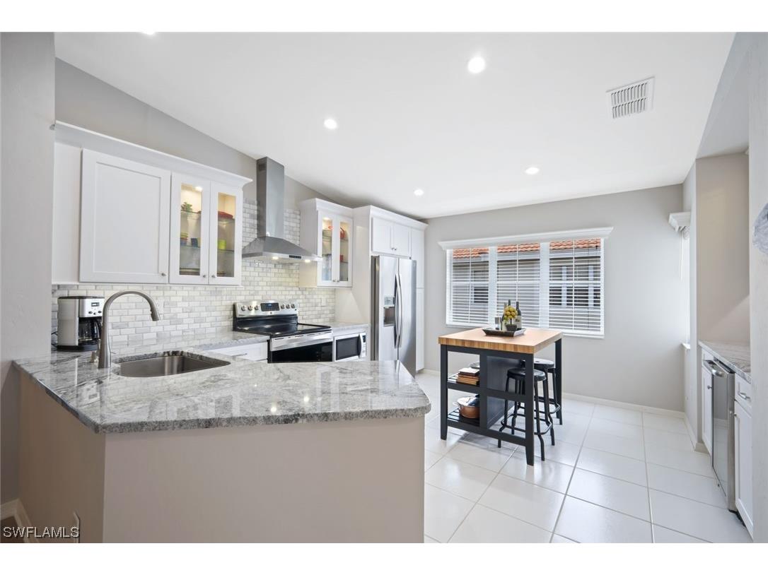 2486 Orchid Bay Drive #X-204 Naples FL 34109 224004785 image1