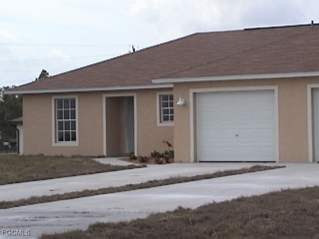 2605/2607 Sunniland Boulevard Lehigh Acres FL 33971 2025021191 image1
