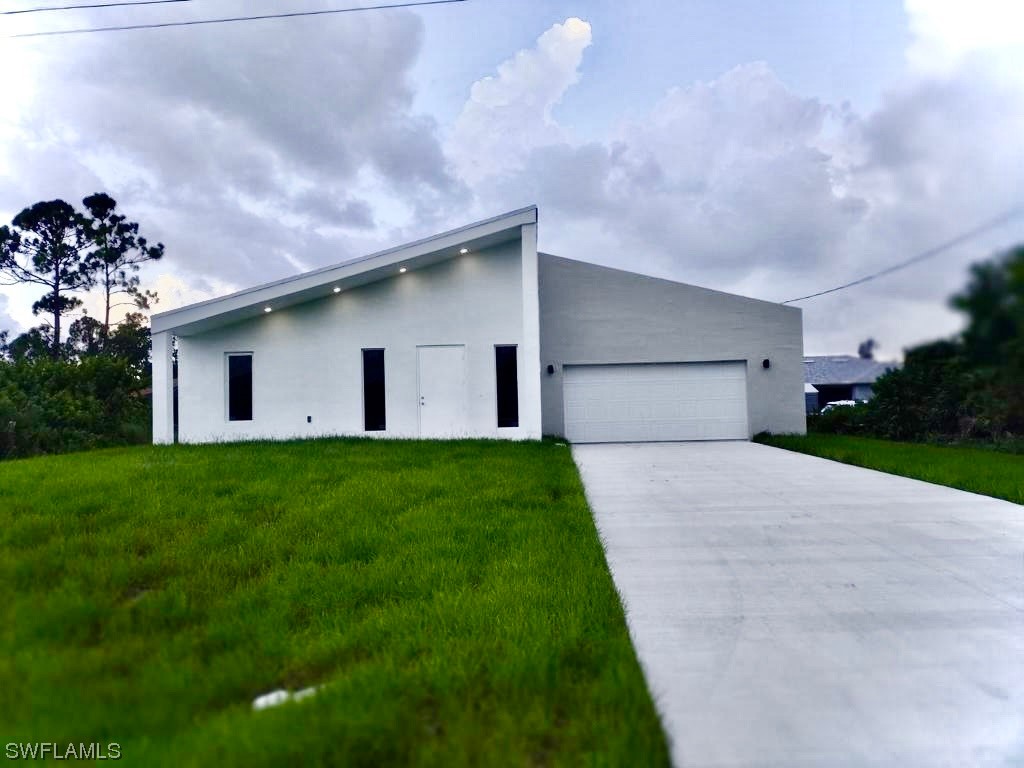 2704 51 Street SW Lehigh Acres FL 33976 223077510 image1