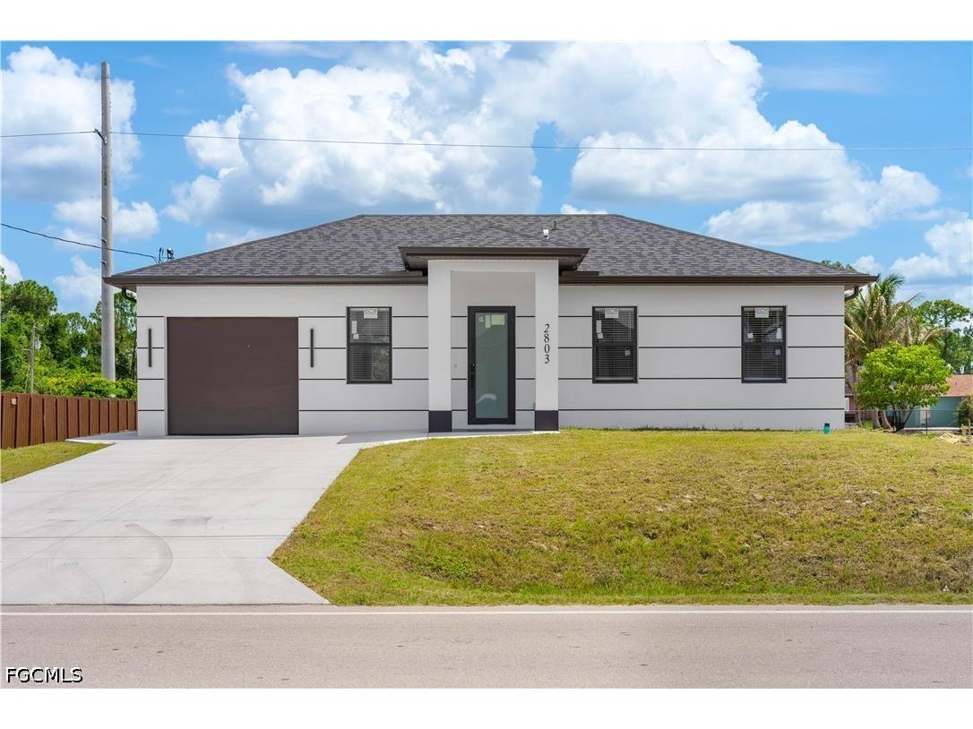 2803 1st Street W Lehigh Acres FL 33971 2026023694 image1