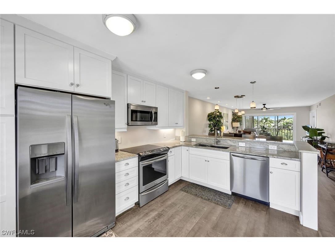3061 Sandpiper Bay Circle #J206 Naples FL 34112 223027034 image1