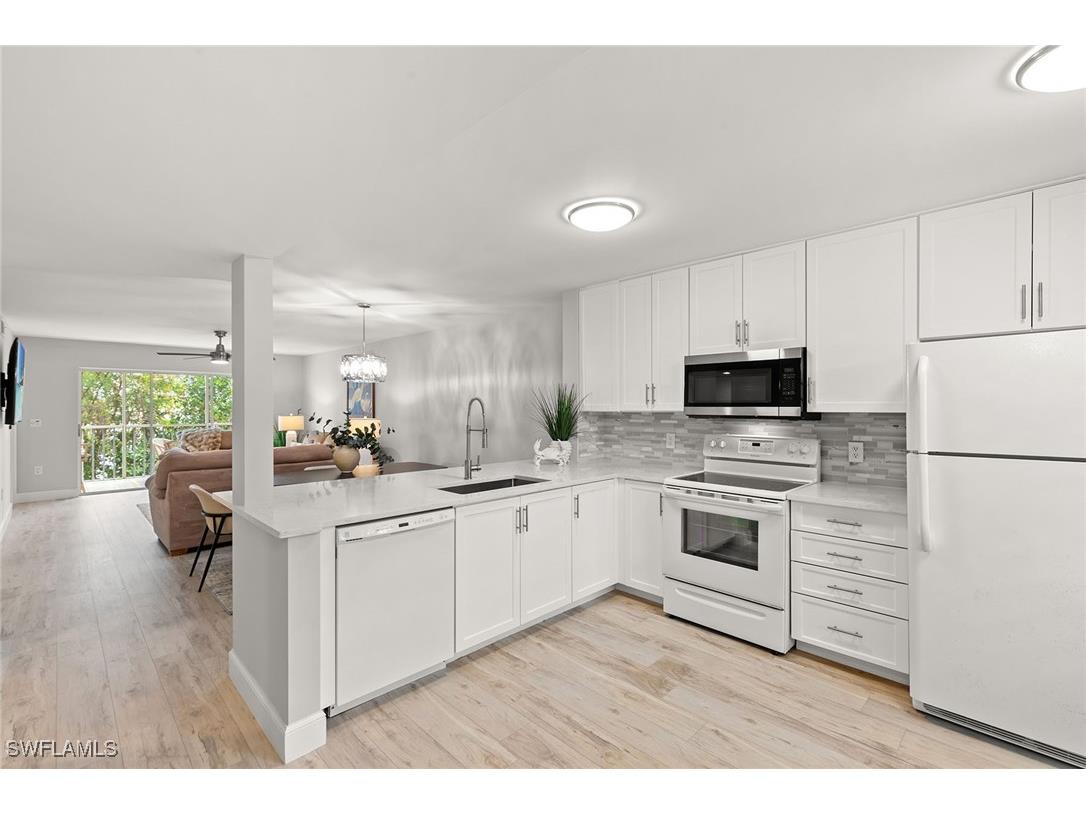 3071 Sandpiper Bay Circle #L205 Naples FL 34112 225076694 image1