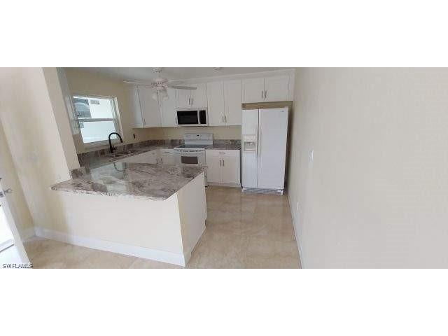 311 Tudor Drive #1-2 Cape Coral FL 33904 223052804 image1