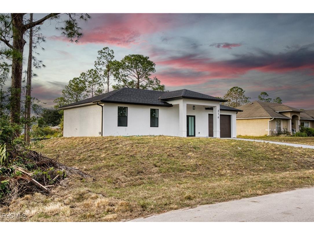 316 Mangonia Avenue Lehigh Acres FL 33974 2025024875 image1