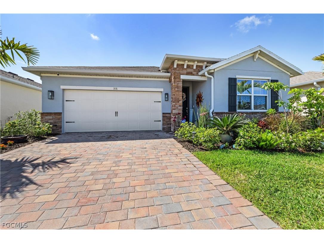 316 Spring Hill Lake Loop Cape Coral FL 33993 2026013034 image1
