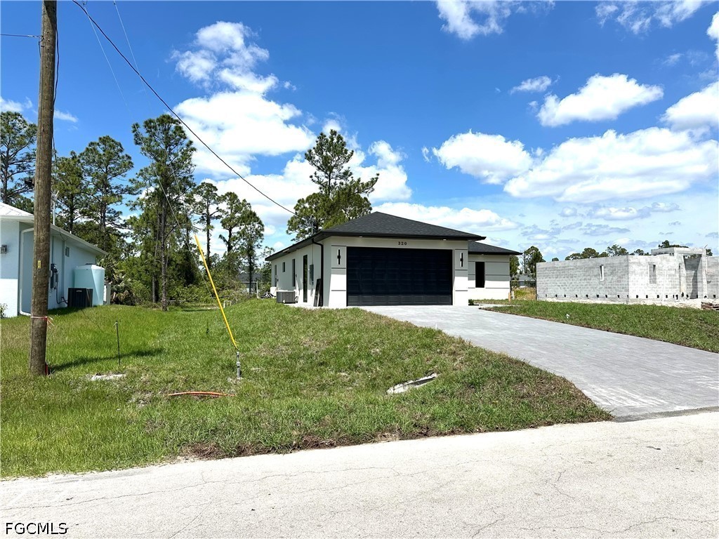 320 Genoa Avenue S Lehigh Acres FL 33974 2026023954 image1