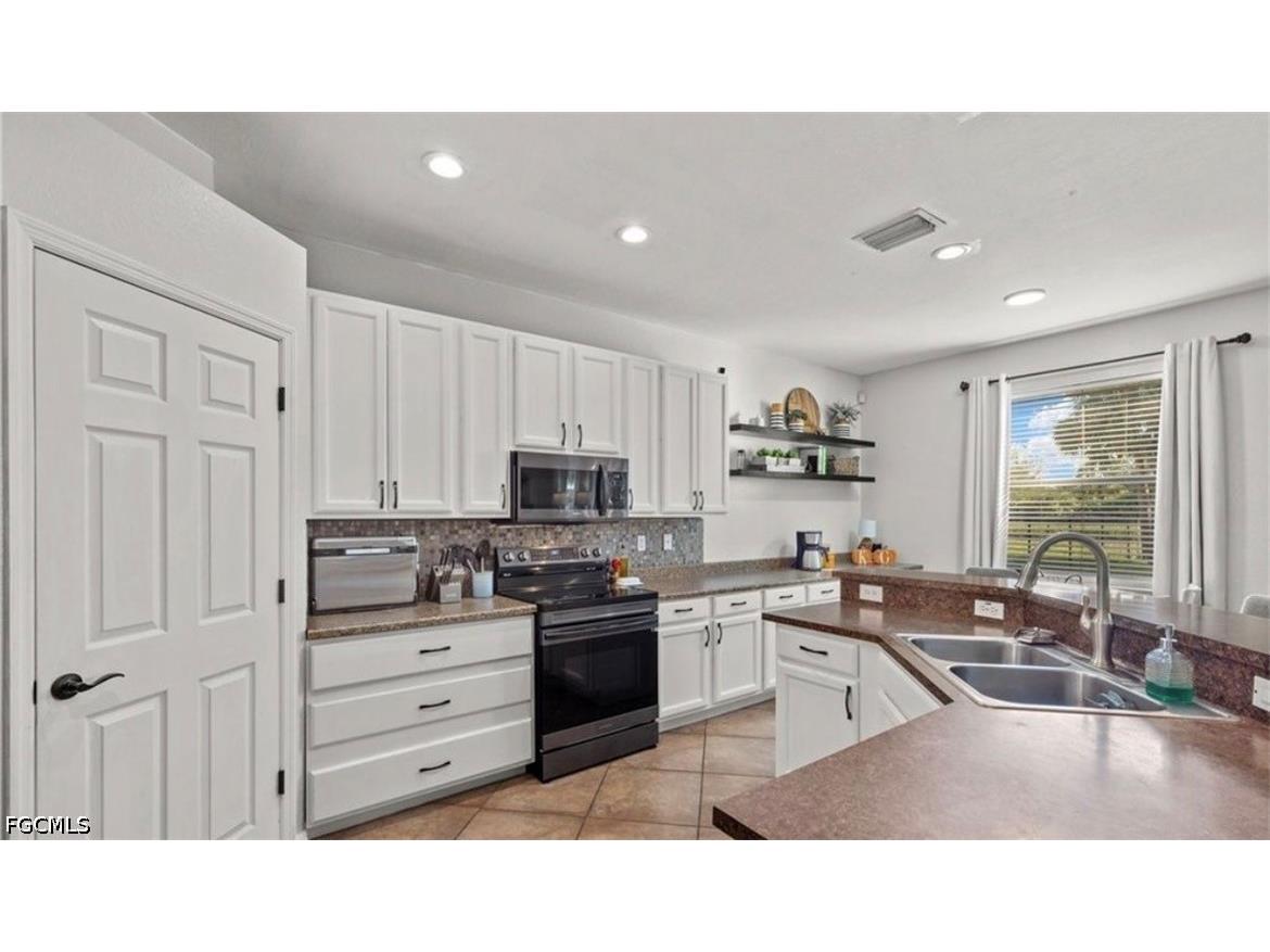 321 Shadow Lakes Drive Lehigh Acres FL 33974 2026025728 image2