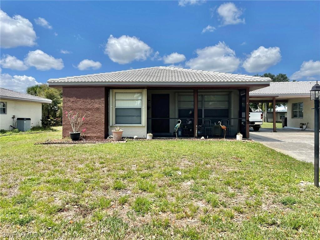 4 Parkwood Villas Court Lehigh Acres FL 33936 223029563 image1