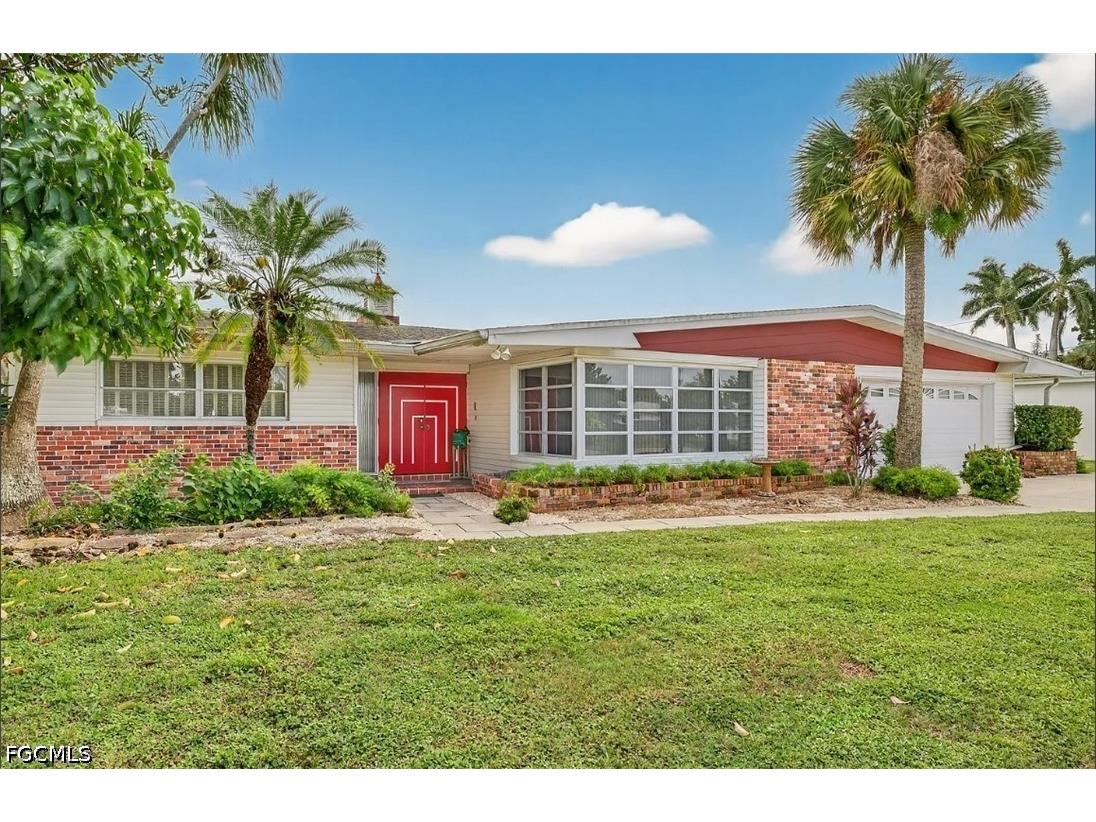 406 Leeland Heights Boulevard E Lehigh Acres FL 33936 2026018633 image1