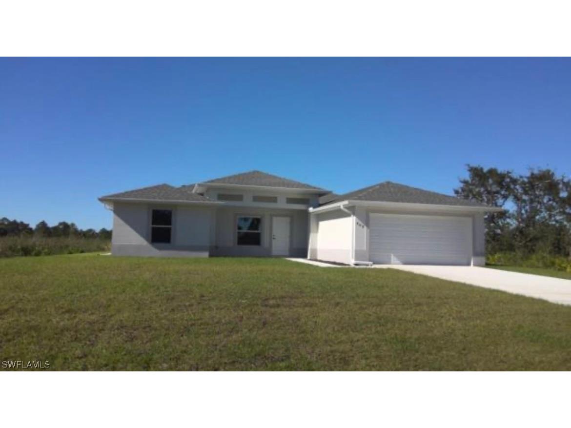 409 Moore Avenue Lehigh Acres FL 33972 223020014 image1