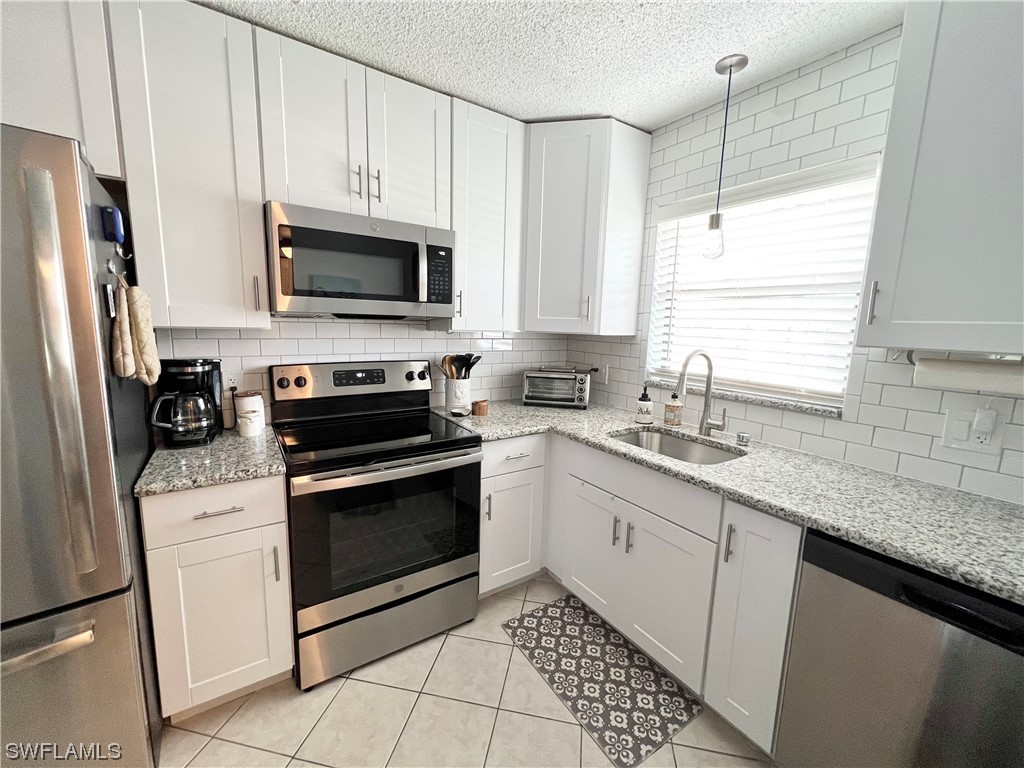 4338 27th Court SW #8-201 Naples FL 34116 224005477 image1