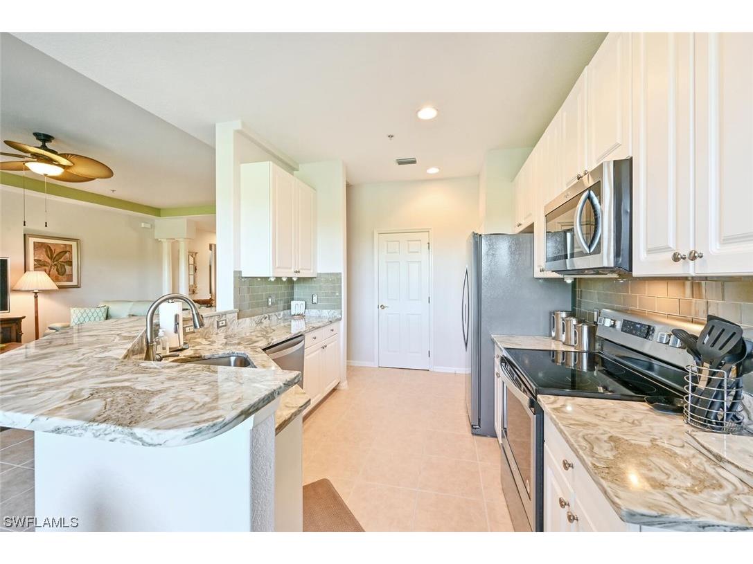 4680 Winged Foot Court #203 Naples FL 34112 223078169 image1