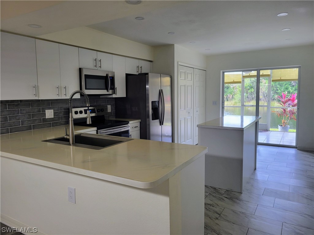 4925 Sandra Bay Drive #2-102 Naples FL 34109 223032364 image1