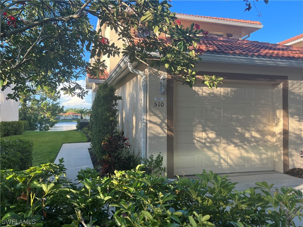 510 Robin Hood Circle #201 Naples FL 34104 223043685 image1