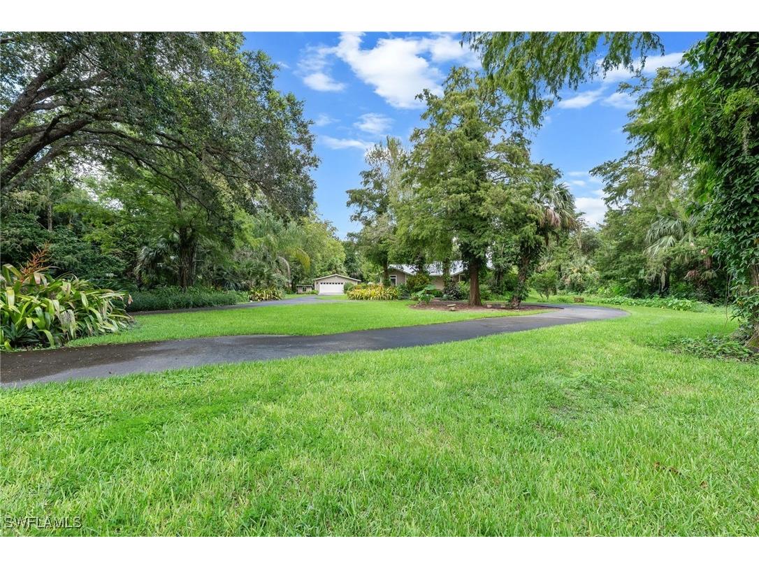 5247 Cherry Wood Drive Naples FL 34119 225067173 image1