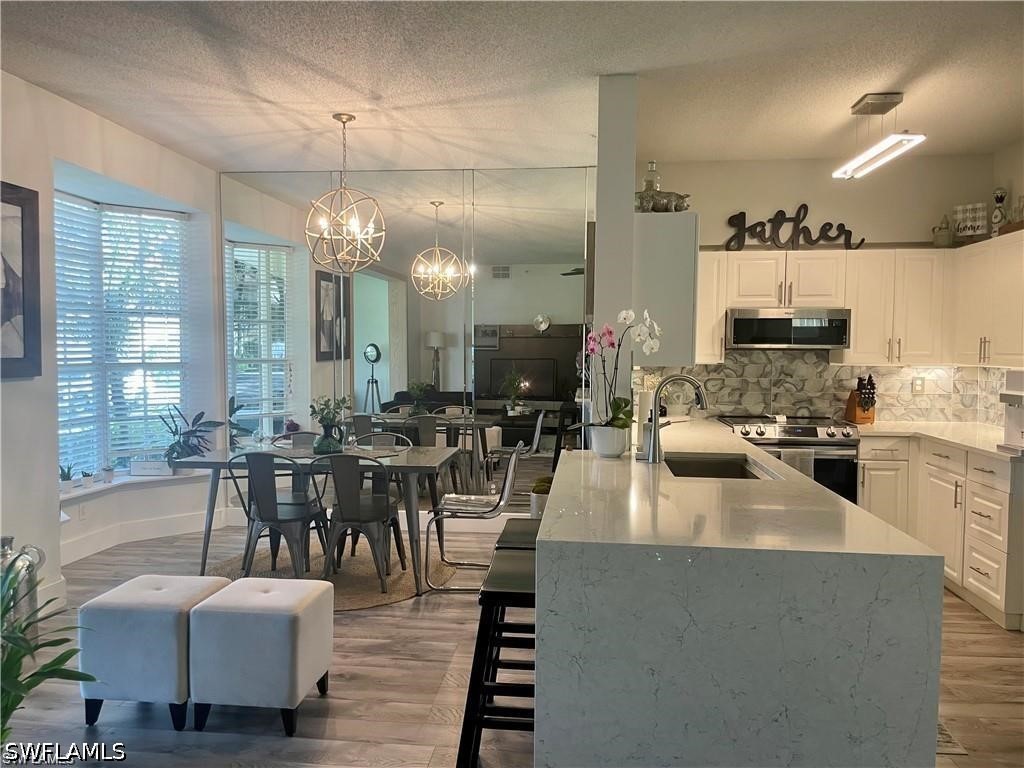 56 Silver Oaks Circle #102 Naples FL 34119 226014799 image1