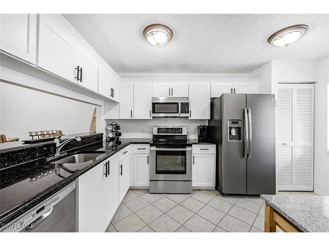 5682 Woodmere Lake Circle #D202 Naples FL 34112 224069324 image1