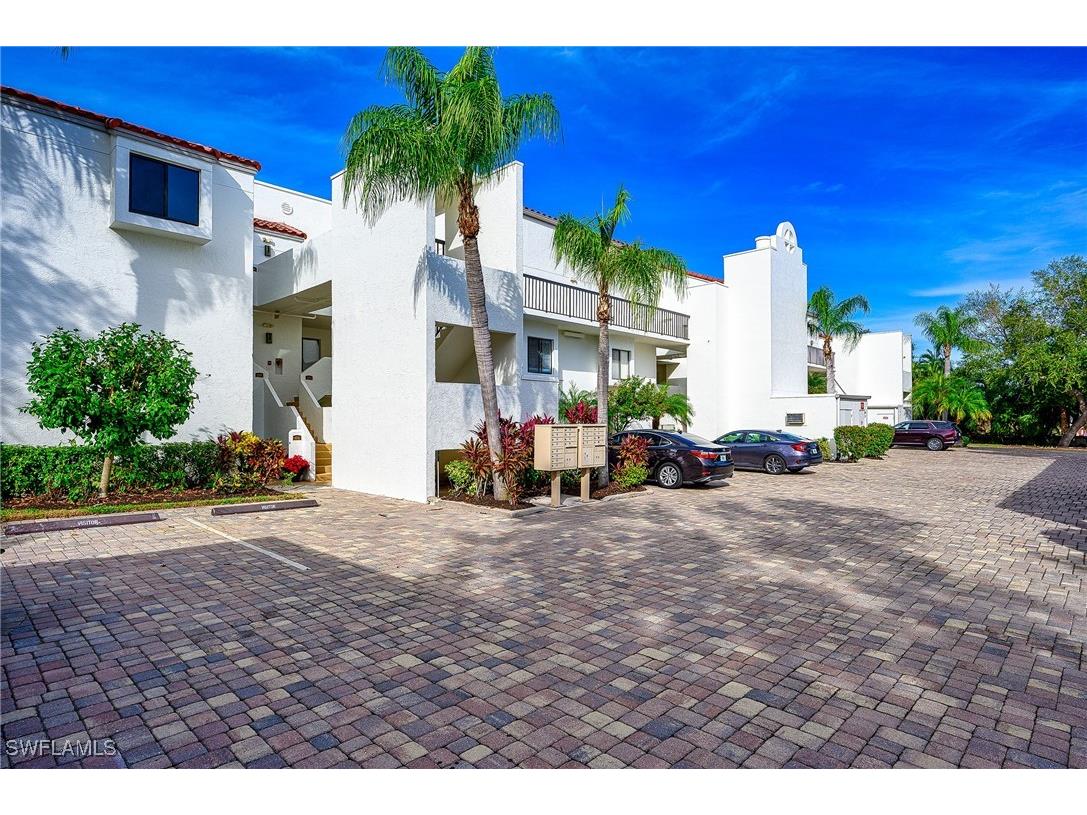 586 Beachwalk Circle #O206 Naples FL 34108 225074639 image1