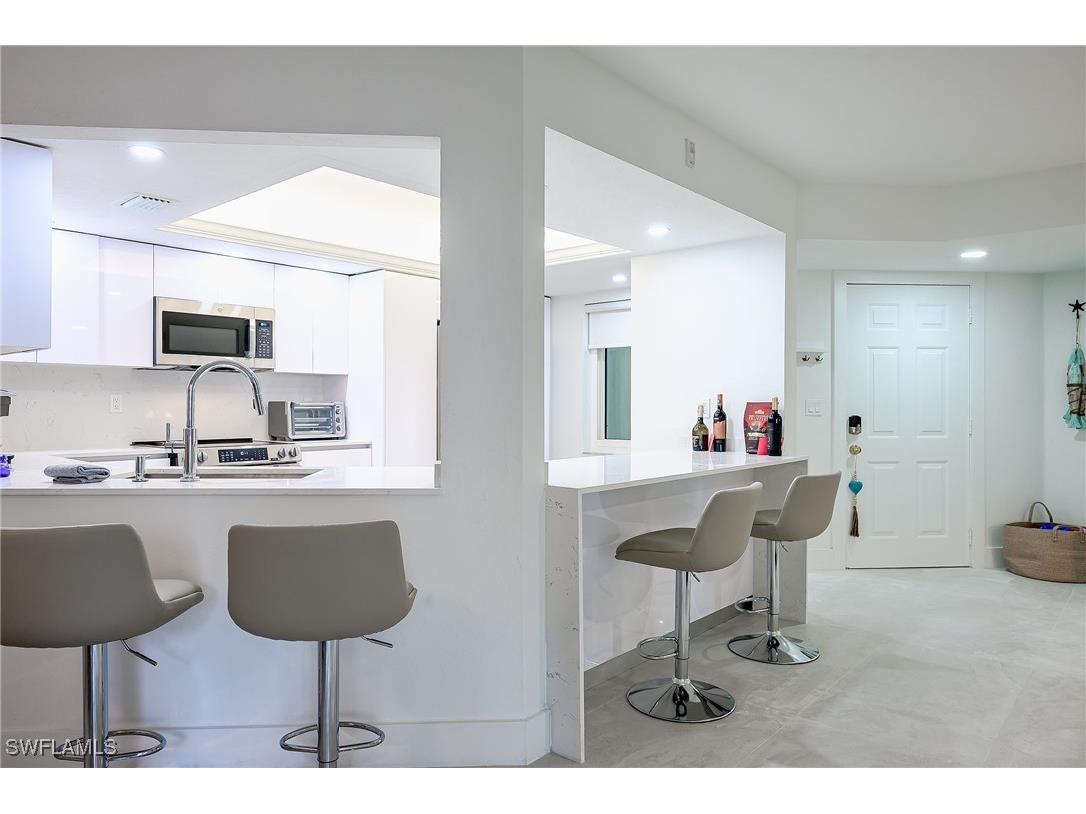 592 Beachwalk Circle #N202 Naples FL 34108 225077958 image1