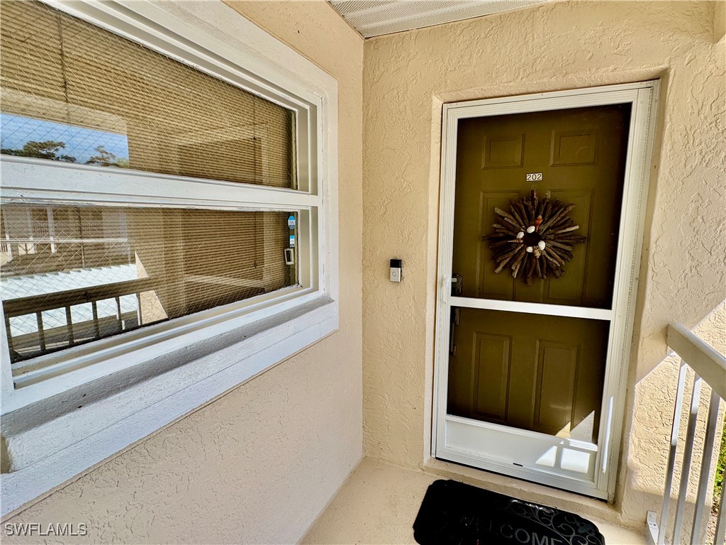 645 Squire Court #202 Naples FL 34104 225079855 image1