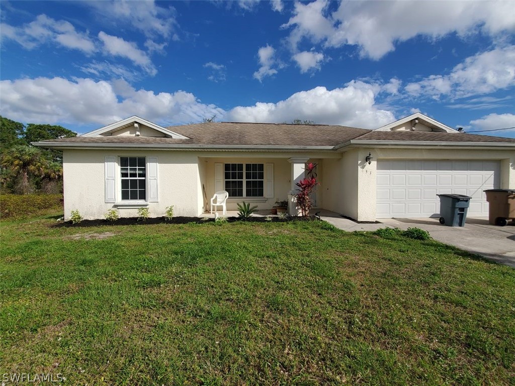 651 Foxchase Drive Lehigh Acres FL 33974 224047761 image1
