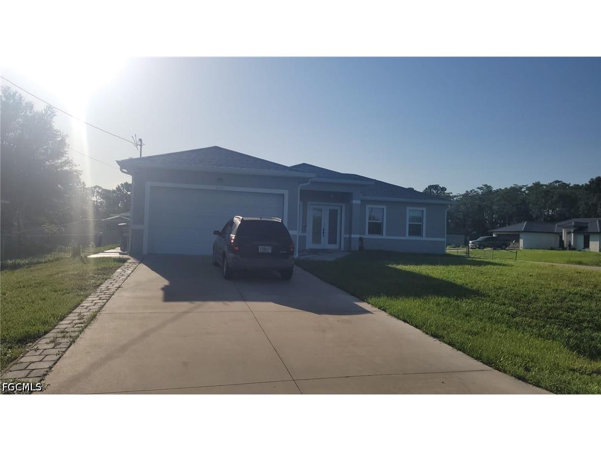 653 Foxchase Drive Lehigh Acres FL 33974 2026027977 image1